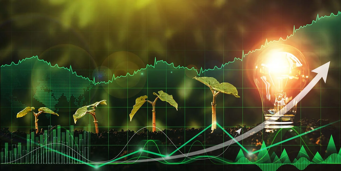 Lightbulb is located on the soil, and plant are growing with digital growth graph.  Alternative sources of energy. Green energy, eco energy concept.Renewable energy generation is essential.